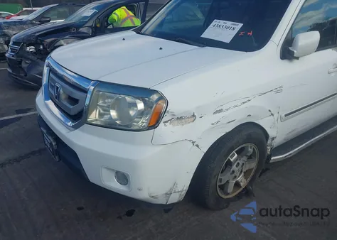 2010 Honda Pilot Touring z USA, uszkodzony, nr VIN 5FNYF3H9XAB012682